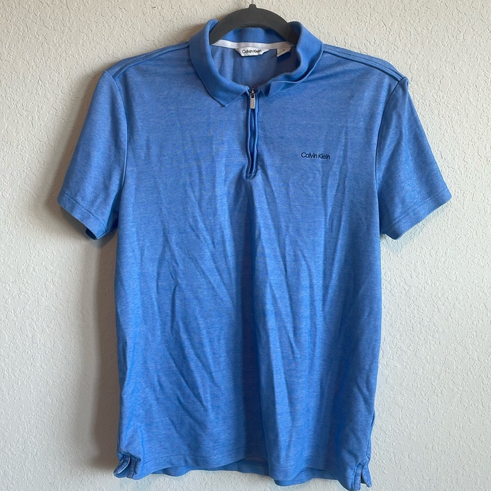 Calvin Klein blue polo shirt